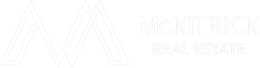 Logo Mckitrick Real Estate blanco
